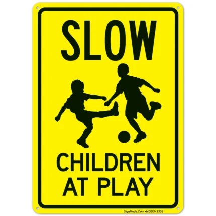 Slow Children At Play Sign With Football Warning Sign