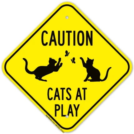 Caution Cats At Play With Graphic Sign